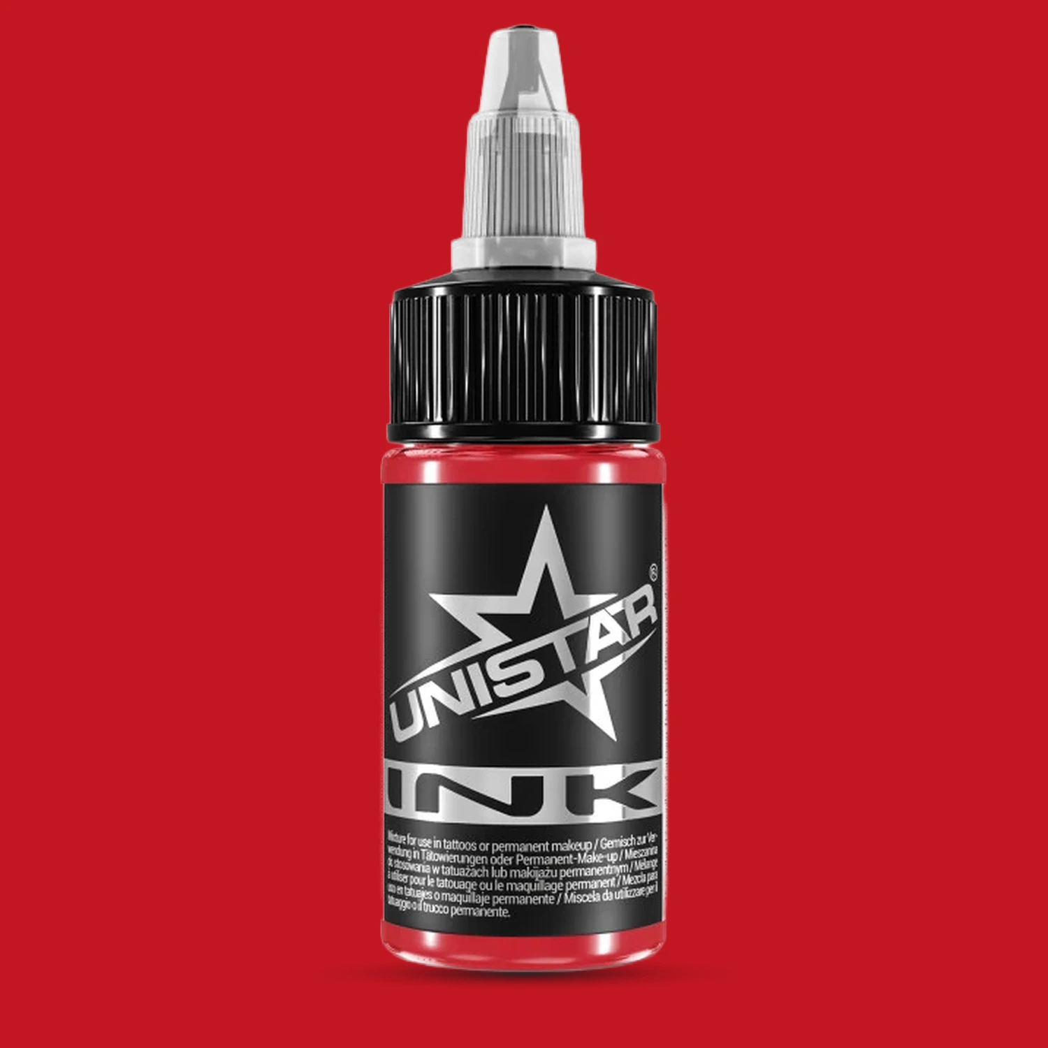 Unistar Top Basic Coral Tattoofarbe in der 30-ml-Flasche vor einem Hintergrund im Farbton der Farbe, rote Tattoofarbe